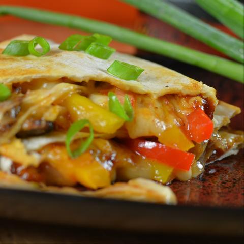 Skirt Steak Quesadillas With Caramelized Onion and Roasted Peppers