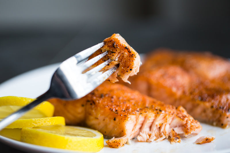 Succulent salmon and lemon wedges